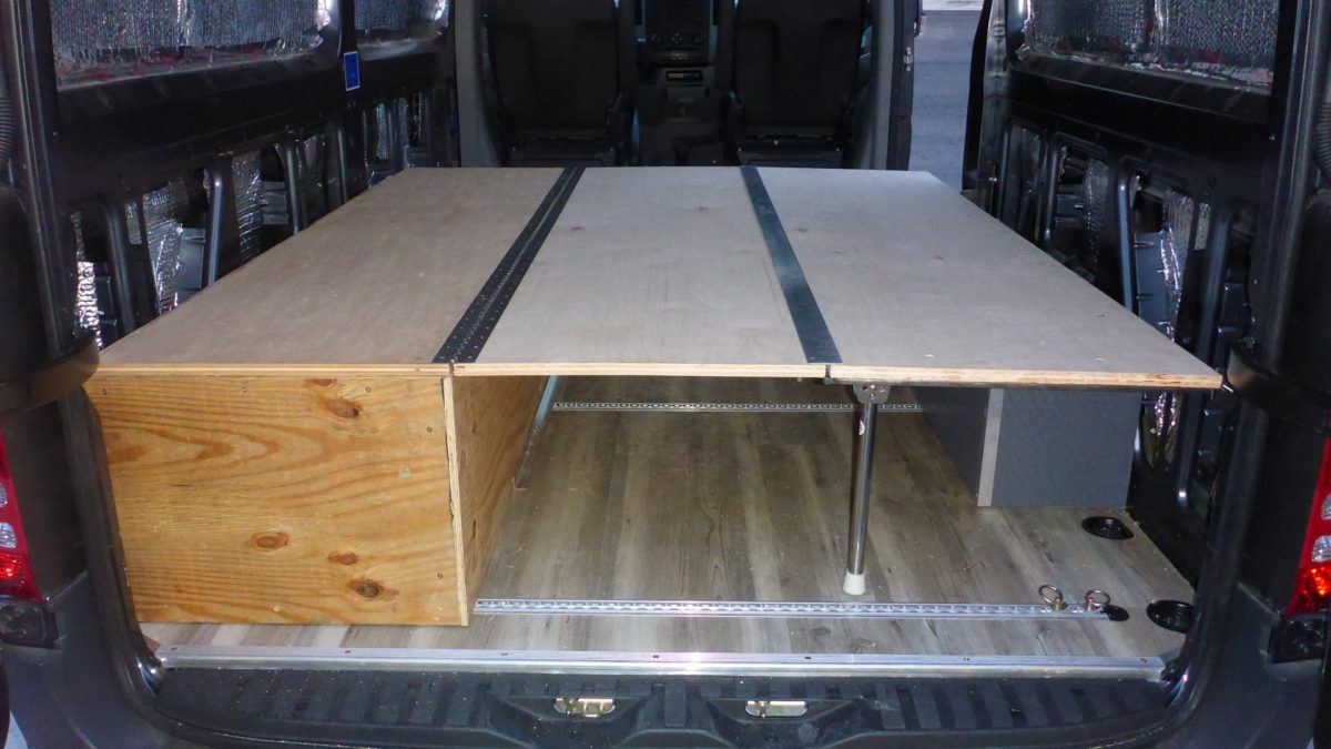 Van with shop fold down bed